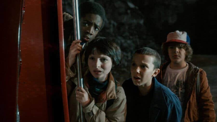 Finn Wolfhard, Millie Bobby Brown, Gaten Matarazzo and Caleb McLaughlin in Stranger Things Season 1