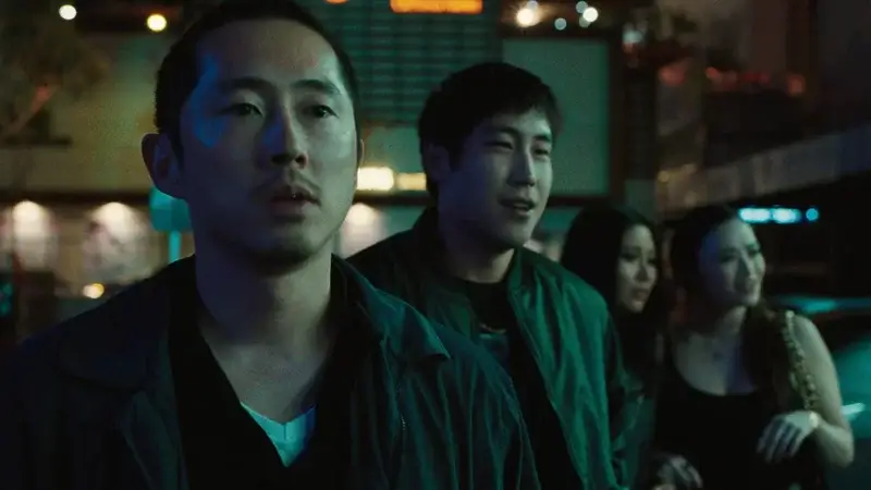 Steven Yeun as Danny Young Mazino as Paul in episode 102 of Beef