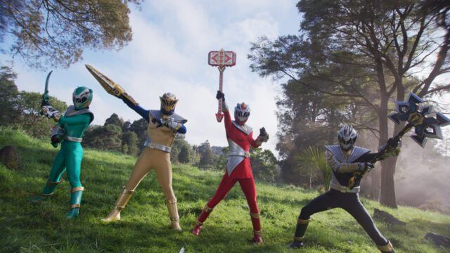 A promotional image for Power Rangers Cosmic Fury, showcasing the team's new uniforms and gear
