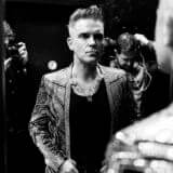 does a business proposal have a happy ending Four Part Robbie Williams Documentary Coming to Netflix in November 2023 Article Photo Teaser